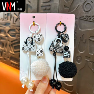 Miu Series Fur Ball Móc khóa Túi tinh tế Mặt dây chuyền Mặt dây chuyền dệt tay sáng tạo