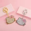 Hello Kitty Hoạt Hình Dễ Thương Nơ Móc Khóa Mặt Dây Chuyền Lấp Lánh Kim Cương Cô Gái Trái Tim Học Sinh Túi Bạn Gái Phụ Kiện
