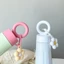 Bình giữ nhiệt tay tròn BL100 quay cầm tròn hiện đại, kèm móc khóa hình hoa dễ thương