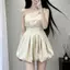 Váy Bud không tay rỗng vai kiểu Pháp che lưng cao che thịt nhìn cao Niche Váy ngắn một mảnh nhỏ