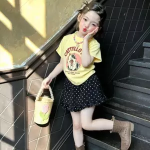 Áo thun hoạt hình màu vàng ngỗng cho trẻ em cỡ vừa (90-150) + Váy xù chấm bi đen Bộ đồ hai mảnh thời trang