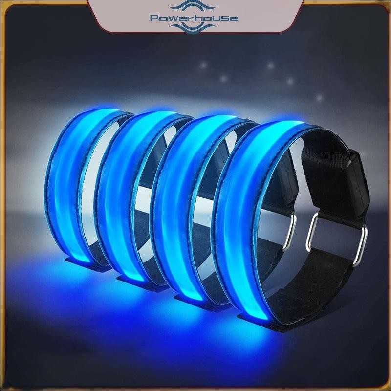Dây đeo tay dạ quang với đèn LED phản quang, dùng cho cổ vũ và cảnh báo an toàn, sạc bằng USB.