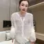 Áo len dệt kim lưới trong suốt rỗng thời trang Áo chống nắng dài tay mỏng thông thường