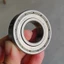 Khuyến mãi giá thấp Nhập khẩu Tháo gỡ Vòng bi hai tay 6205ZZ Sản phẩm hạng nhất Cảm thấy tốt Nguyên bản Dầu gốc 95% Mới 42R1
