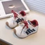 Tiếng Việt: Giày sneaker trẻ em bé trai bé gái phong cách thể thao, đế mềm chống trượt đi học đi chơi