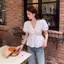 Áo sơ mi ngắn tay xoắn xếp li Phiên bản thịt rộng rãi mùa hè ngọt ngào phù hợp với mọi trận đấu Áo sơ mi nhỏ sang trọng