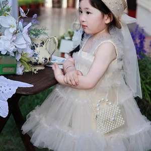 Túi ngọc trai mùa hè có giá trị cao cho bé gái Túi Messenger tinh tế Phong cách phương Tây Phù hợp với ánh sáng sang trọng Túi xách đi chơi cho bé gái