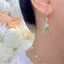 Phong Cách Trung Hoa Màu Mắt Mèo Bầu Bông Tai Dài 2025 Siêu Trắng Người Già Mẹ Bông Tai Nữ