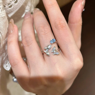 Nhẫn nữ giọt nước xanh topaz với thiết kế cánh bướm, phong cách thoáng mát