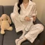 Bộ Đồ Ngủ Xuân Thu Bộ Hai Chiếc Dài Tay Lụa Băng Cho Nữ Bộ Đồ Mặc Nhà Cao Cấp Kẻ Sọc Loại Mỏng Lụa Mẫu Mới Năm 2025