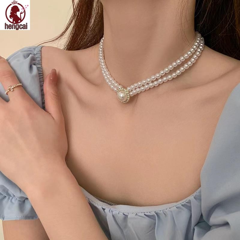 Bộ trang sức ngọc trai thanh lịch cho bé gái gồm bông tai, vòng cổ và vòng tay