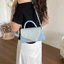 SQ11 2026 Túi đeo vai thời trang mới mùa hè với kết cấu đơn giản Túi xách Niche cá tính hợp thời trang
