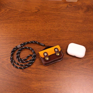 Vỏ bảo vệ tai nghe 66798 / Thích ứng với mọi loại tai nghe Bluetooth / Lưu trữ cáp dữ liệu / Chống thất lạc / Chất liệu da bò lớp một / Influencer Bán chạy / Handmade / Chống mài mòn / Mini