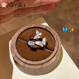 Nhẫn nữ giọt nước xanh topaz với thiết kế cánh bướm, phong cách thoáng mát