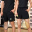 Tập luyện mùa hè thể thao Li Ning quần short ống thẳng nhẹ nam nữ leo núi đi xe đạp chạy bộ thể dục quần short lụa băng ba phút