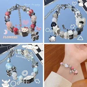 Vòng tay đính cườm họa tiết chuông mèo con