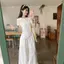 Áo thun trắng tay ngắn lười biếng có dây buộc thiết kế mùa hè mới mỏng hơi trong suốt Top Loose Laced-Up Kem chống nắng