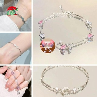 Vòng tay hình ngôi sao hoa anh đào zircon màu hồng, phù hợp cho nữ với vẻ đẹp sang trọng và cao cấp.