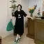 Mùa hè 2026 Plus size Hàn Quốc Áo thun cổ tròn dáng rộng Flesh Over-the-Knee Mid-Length Casual Hợp thời trang Sli