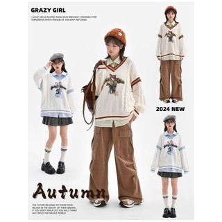 Áo len cổ chữ V xoắn dệt kim phong cách preppy, màu sắc tương phản và họa tiết thêu Judy Nick