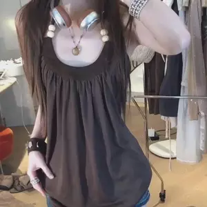 Mùa hè Phong cách Pháp Cổ xưa Màu cà phê Camisole Xếp li Dây gai dầu Trang trí Retro Tính khí Niche Slim-fit Áo không tay cho nữ
