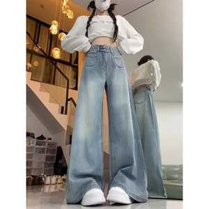 Quần jean nữ thu đông cao cấp, size lớn, drap ôm với đôi nút màu xanh sáng và thiết kế rộng rãi.
