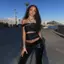 Mùa hè 2026 Trailing Sister Hot Girl Rỗng xiên Vai Áo Vest Thiết kế bất đối xứng Slim fit Crop Ngắn Niche Slimer Look Áo không tay Top Nữ
