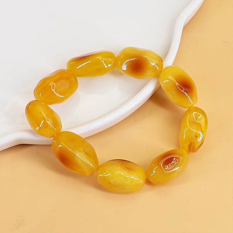 Vòng tay hổ phách thời trang hạt không đều, thiết kế phát sáng màu vàng cam - Phụ kiện thời trang cao cấp