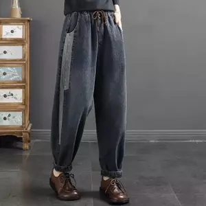 Mùa xuân thu 2026 Retro Đau khổ Màu sắc tương phản đến mắt cá chân Quần jean Harem co giãn eo cao Vỏ rộng thịt Phong cách phương Tây Phù hợp với quần cỡ lớn thông thường dành cho nữ