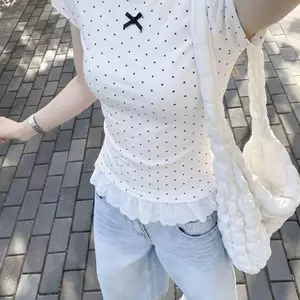 Áo thun ngắn tay chấm bi ren ngọt ngào Hàn Quốc dành cho nữ mùa hè 2026 Phong cách mới Slim-fit Slimer Look Design Top