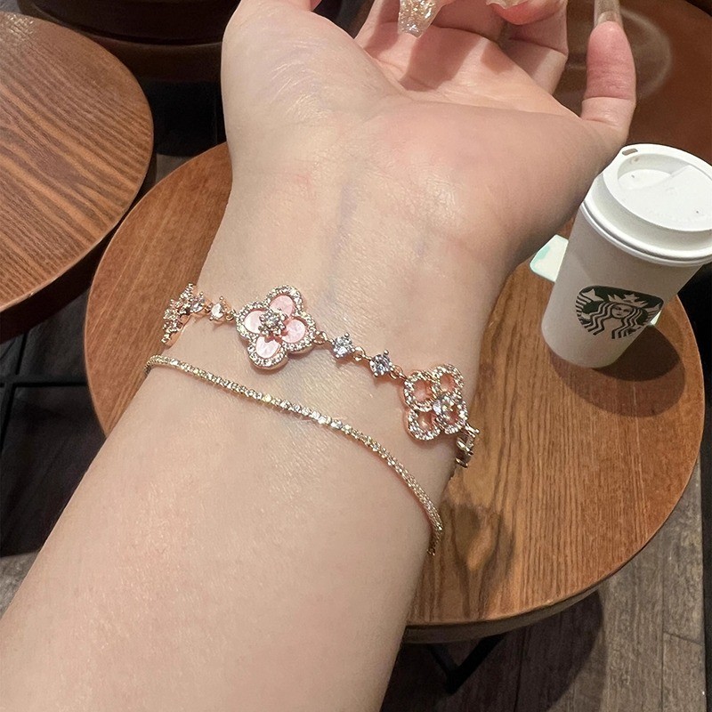Vòng tay cỏ bốn lá rỗng zirconia thời trang Hàn Quốc nữ màu bạc quà tặng sinh nhật sinh viên