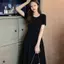 Mùa hè 2026 Plus size Hơi béo eo hẹp Váy thường ngày che phủ da thịt Tính khí giảm tuổi phù hợp với tất cả các trận đấu dài béo mm Váy đi lại hàng ngày dành cho nữ