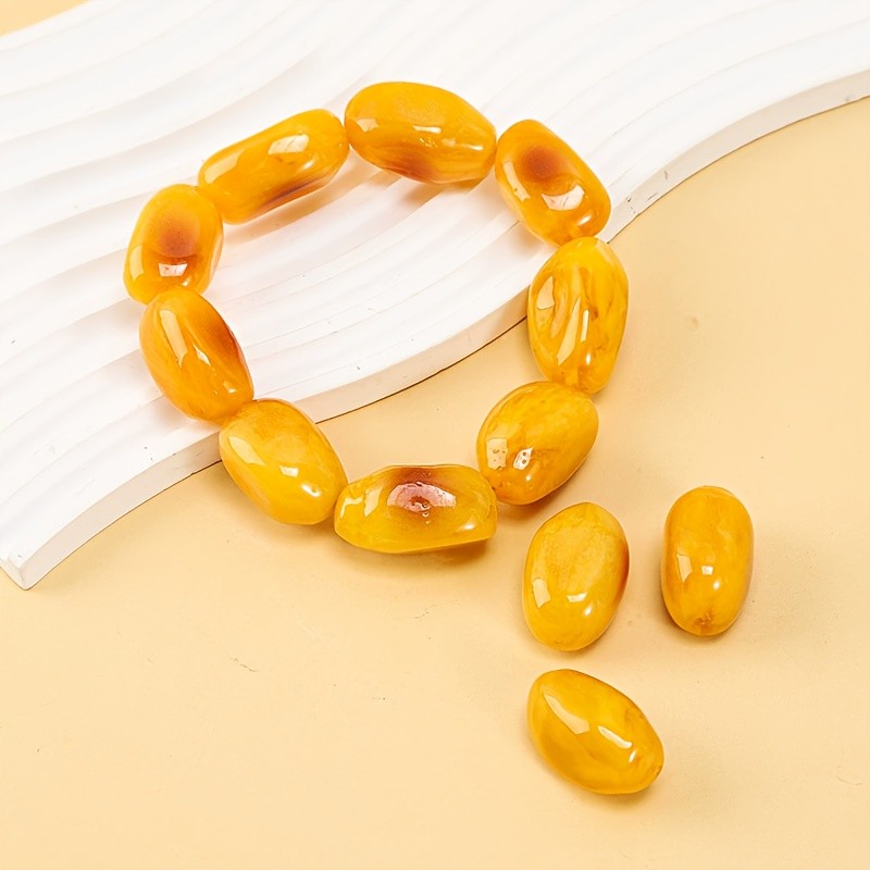 Vòng tay hổ phách thời trang hạt không đều, thiết kế phát sáng màu vàng cam - Phụ kiện thời trang cao cấp