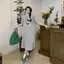 Mùa hè 2026 Plus size Hàn Quốc Áo thun cổ tròn dáng rộng Flesh Over-the-Knee Mid-Length Casual Hợp thời trang Sli
