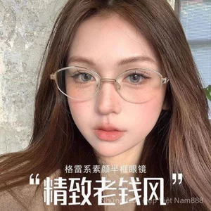 Khung lạnh Phiên bản Hàn Quốc Kính nửa mặt thông minh Hình bầu dục Mặt trơn chống ánh sáng xanh viền vàng cao Stu