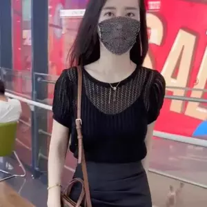 Áo chống nắng rỗng bằng lụa băng mùa hè 2026 Áo dệt kim lưng rỗng dáng rộng phong cách ngắn bên ngoài Vỏ bọc Flesh Slimmer Look All-match Light Short @ -