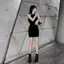 Mùa hè 2026 Váy ngắn dây đen cao cấp kiểu Pháp Váy ngắn cạp mông hẹp Slim-fit Slimer Look Pure Desire Hot Girl Tính khí không tay V