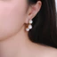 Hoa Tai nữ uốn mềm Timeless Touch mạ vàng cao cấp thanh lịch, sang trọng thiết kế hiện đại - DOJI