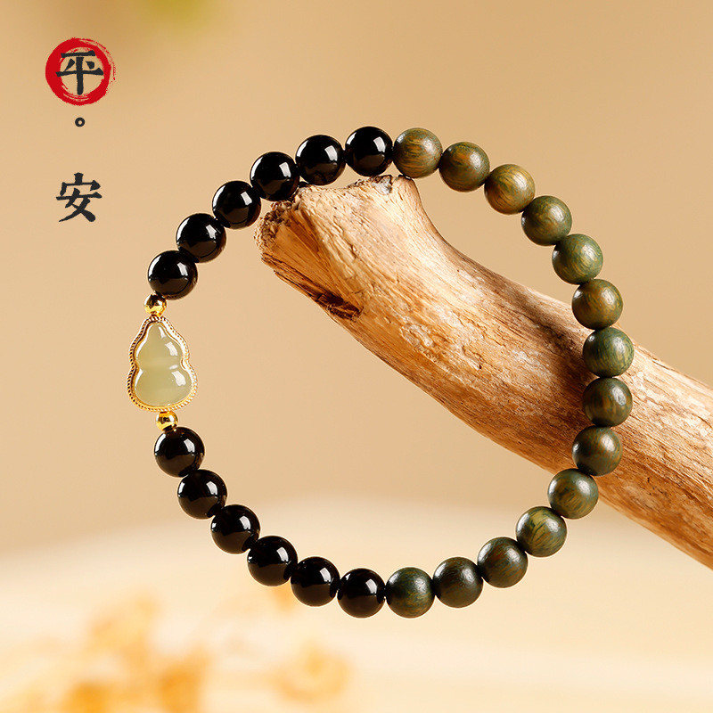 Vòng tay bầu Obsidian đen tự nhiên đơn giản