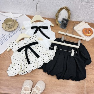 10-27kg Set áo nơ đen mix chân váy bí TM