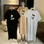 Mùa hè 2026 Plus size Hàn Quốc Áo thun cổ tròn dáng rộng Flesh Over-the-Knee Mid-Length Casual Hợp thời trang Sli