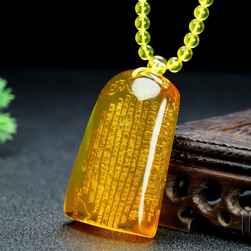 Vòng cổ bohemian màu hổ phách với chạm khắc trái tim cổ xưa, đồ trang trí treo