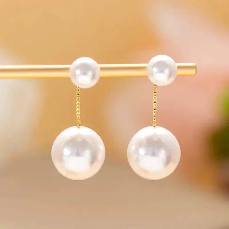 Bông tai ngọc trai hình trái tim, kiểu retro sang trọng, phù hợp với trang phục đơn giản
