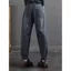 Mùa xuân thu 2026 Retro Đau khổ Màu sắc tương phản đến mắt cá chân Quần jean Harem co giãn eo cao Vỏ rộng thịt Phong cách phương Tây Phù hợp với quần cỡ lớn thông thường dành cho nữ