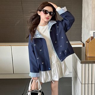 Áo khoác gió bé gái Hàn Quốc – Họa tiết nơ dễ thương, mũ liền thời trang