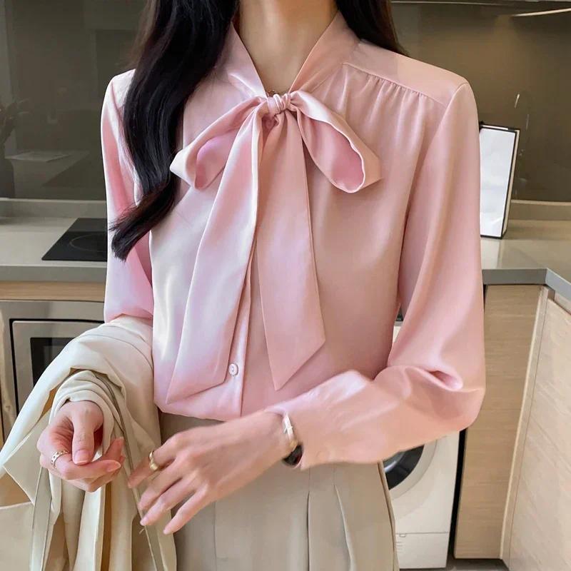Áo sơ mi thu đông nữ phong cách Hàn Quốc, chất liệu satin với nơ đen.