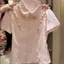 Mùa hè 2026 Áo sơ mi cổ búp bê màu hồng phong cách Hàn Quốc Filigreek Eo hẹp Giảm tuổi Sweet Niche Slim-fit Slimmer Look All-match Short Top Women
