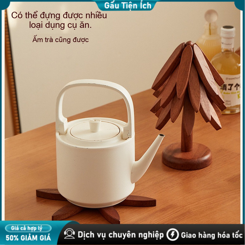 Miếng lót cách nhiệt hình cây thông, đậm không khí lễ! Gỗ chất lượng cách nhiệt tốt.
