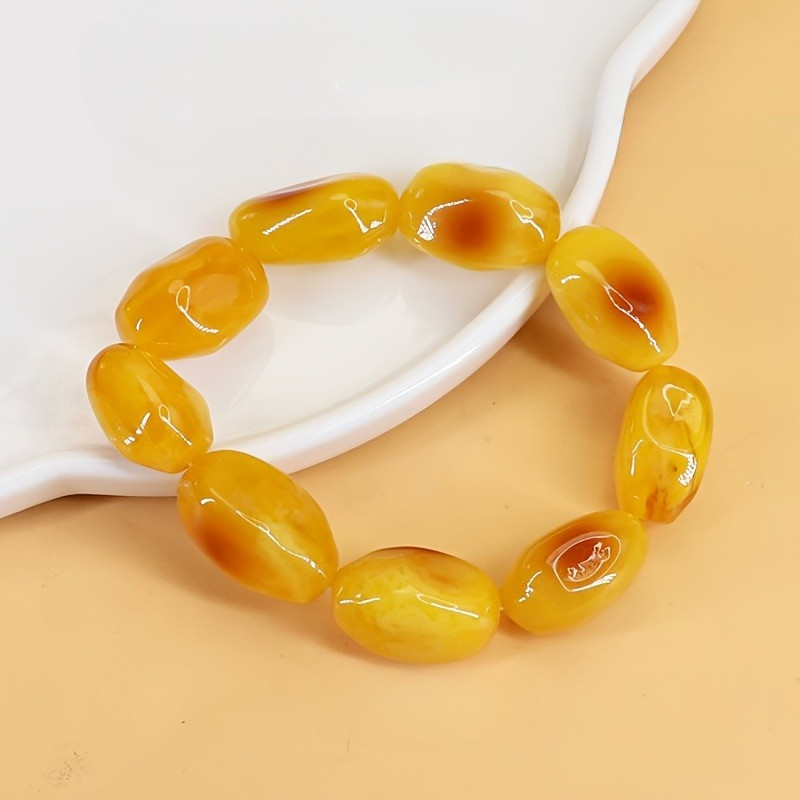 Vòng tay hổ phách thời trang hạt không đều, thiết kế phát sáng màu vàng cam - Phụ kiện thời trang cao cấp