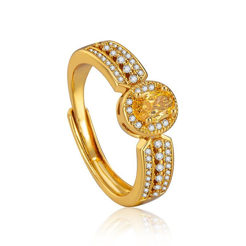 Nhẫn champagne vàng thật với ánh sáng nhiều màu sắc, phong cách sang trọng, phù hợp với phụ kiện khác.